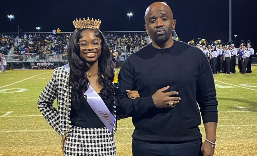 Homecoming queen Skylar Winfrey and her father